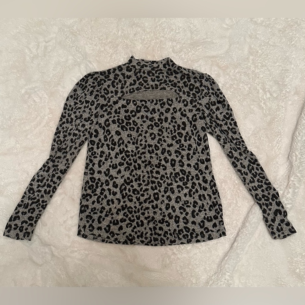 Black and gray leopard print long sleeved shirt, hardly worn, and size small.